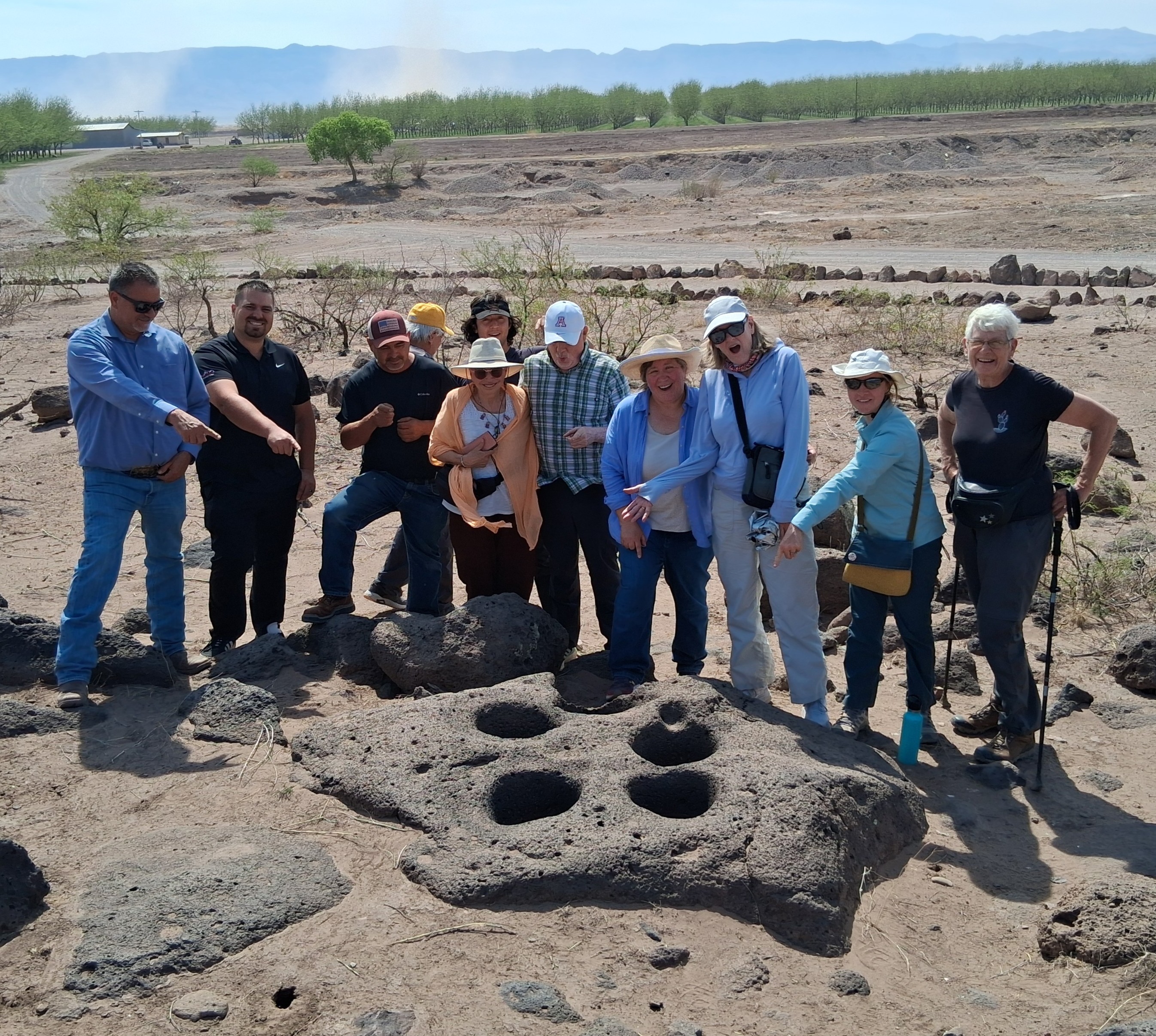group pointing at something awesome